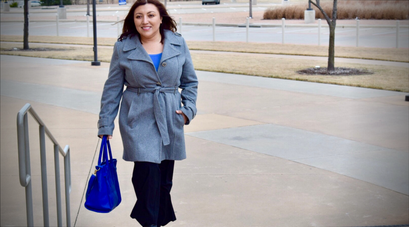 ericka walking with her blue bag